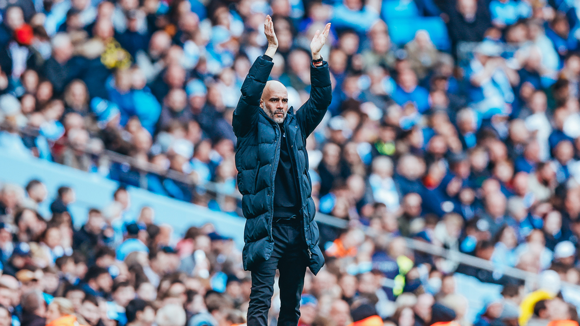 THE BOSS: Applauds his side.