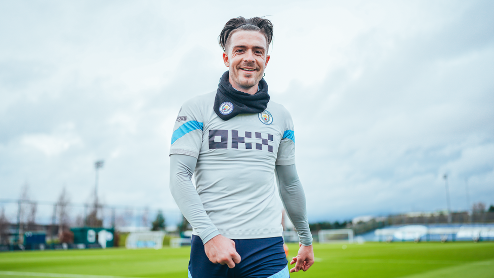 JACK IN THE BOX : Jack Grealish all-smiles as he returns to training at the CFA