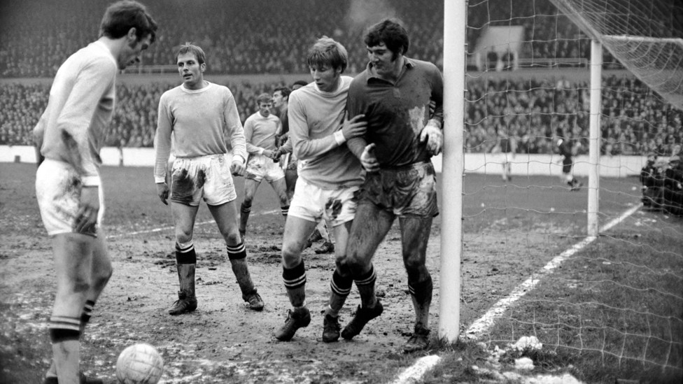 WELL DONE : Colin Bell congratulates Joe after a big save