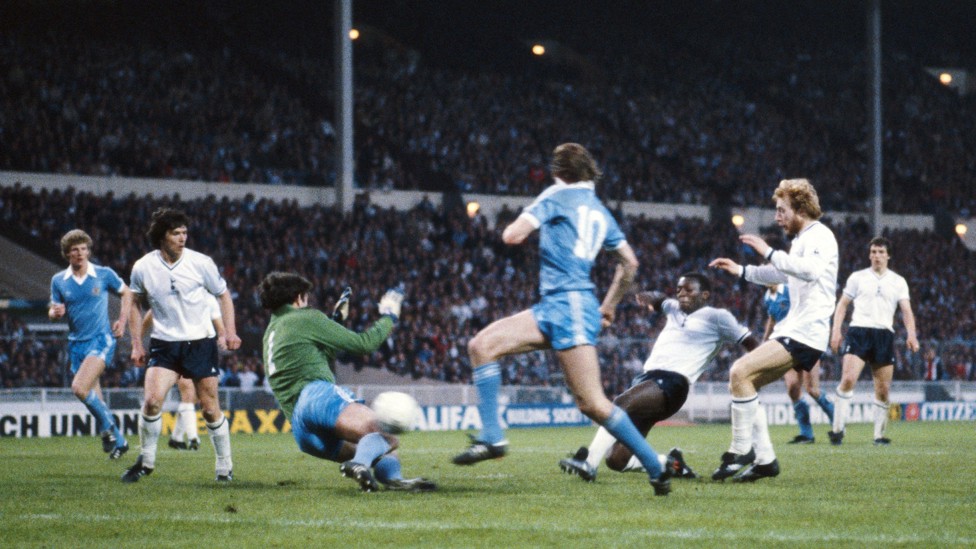 FULL STRETCH : The goalkeeper dives at the feet of Garth Crooks in the 1981 Wembley showpiece