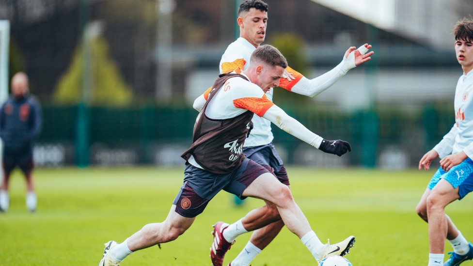 BATTLING IT OUT : Sergio Gomez and Matheus Nunes fight for the ball in training