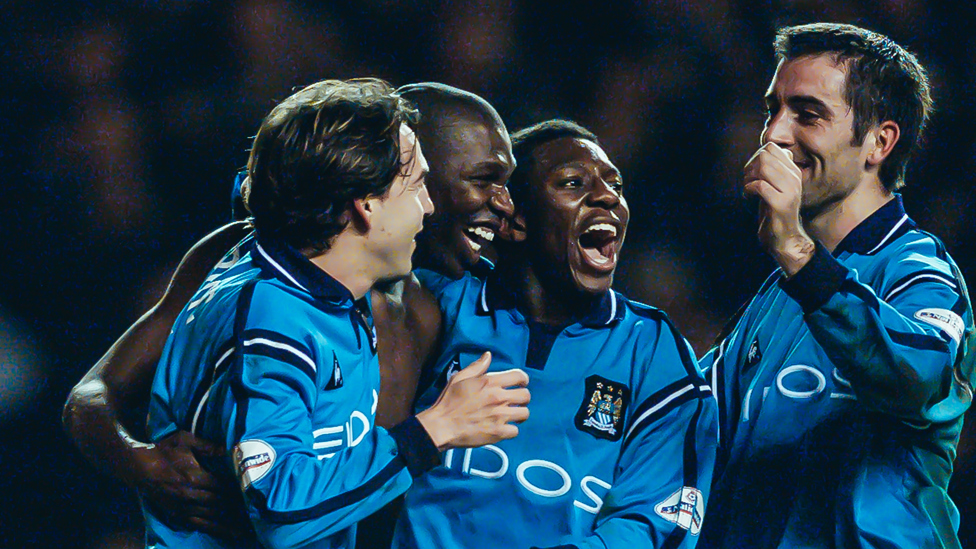 ALL TOGETHER NOW : Eyal Berkovic, Shaun Goater, Shaun Wright-Phillips and Kevin Horlock celebrate as City beat Millwall 2-0 despite Ali Bernabia seeing red inside seven minutes | 30 January 2002.