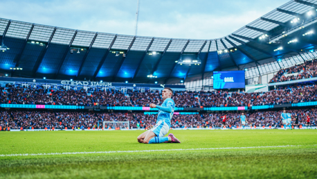 KNEE SLIDE: Foden enjoyed that one!