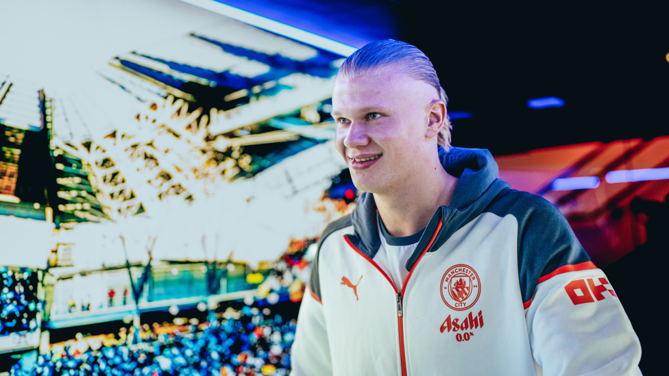 HAPPY HAALAND : Erling in good spirits when arriving at the stadium.