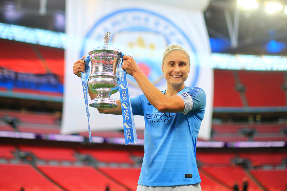 SILVERWARE EVERYWHERE : Steph Houghton wins her second FA Cup trophy in 2019.