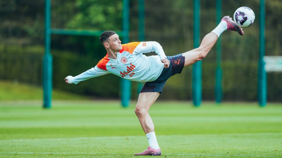 CLOSE CONTROL : Phil Foden at full stretch