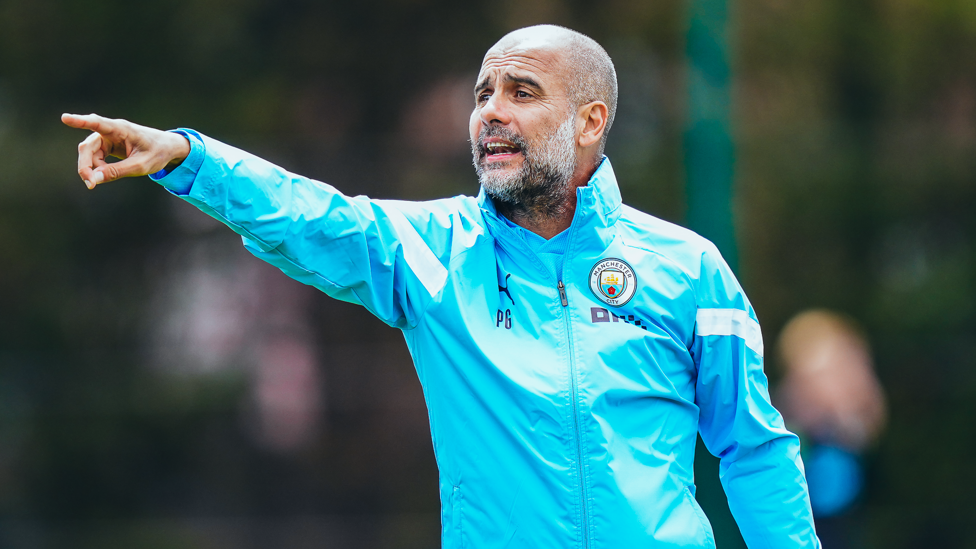 PEP'S POINTER: The boss hands out more crucial advice to the squad