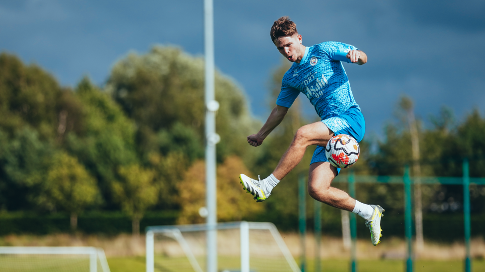 JUMPING JAMES  : James McAtee controls the ball in the air. 