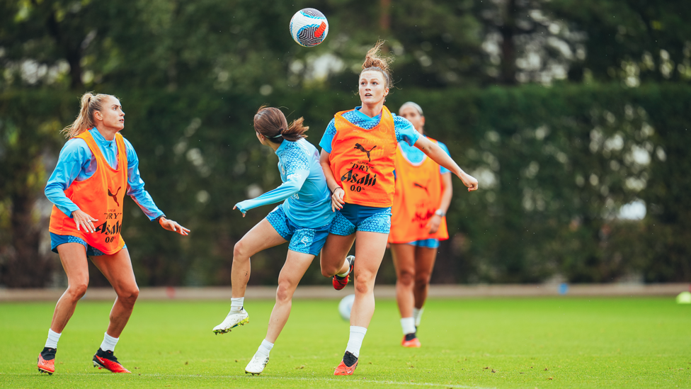 BATTLING : Ruby Mace working hard to win possession.