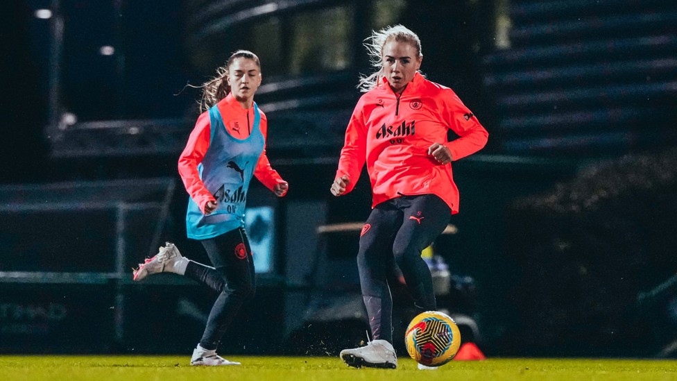 PLAY IT OUT : Alex Greenwood cushions an intricate pass