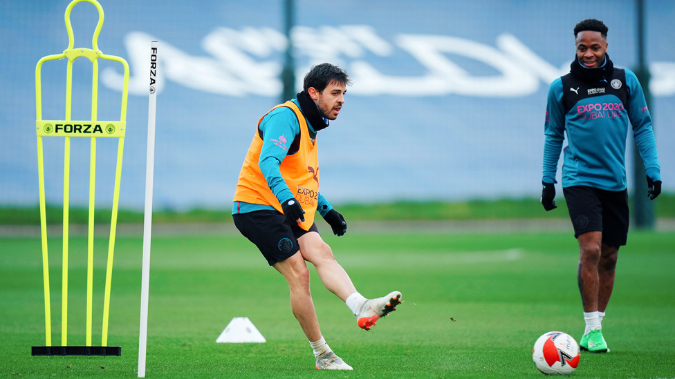 Bernardo shoots while Raheem watches on