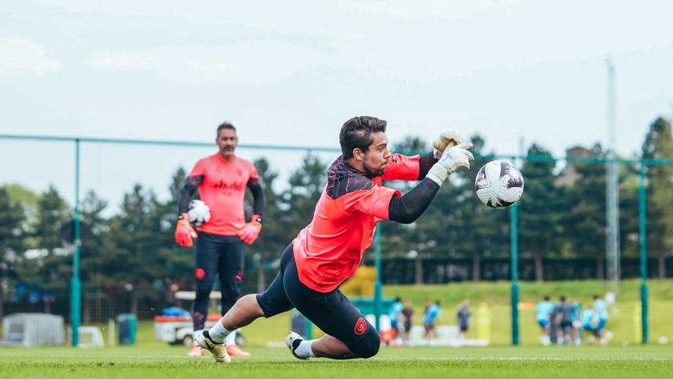 STEFAN SAVES : Our German stopper beats away the ball in training