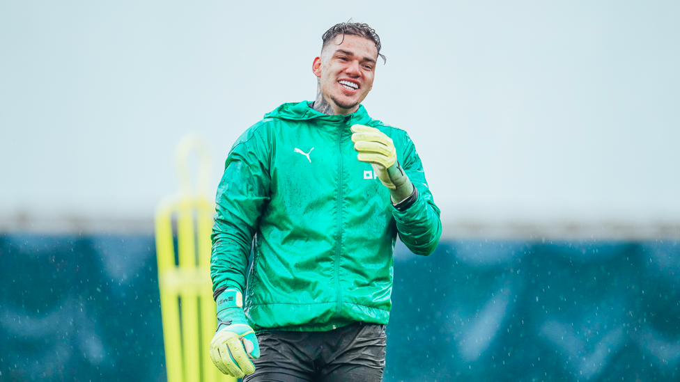 SAFE HANDS : Ederson in, understandably, fine spirits after keeping a clean sheet against Bayern Munich in midweek