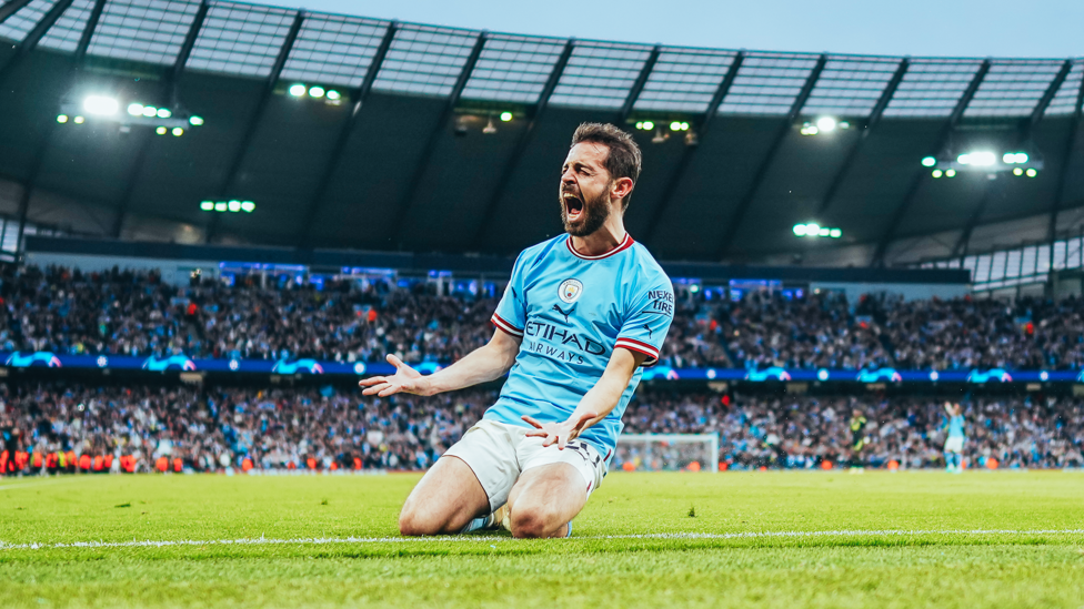 KNEE SLIDE : Bernardo celebrates his second of the evening.