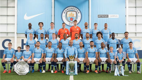 MAGIC MOMENT: Brave patients from the Royal Manchester Children's Hospital pose with the Manchester City squad