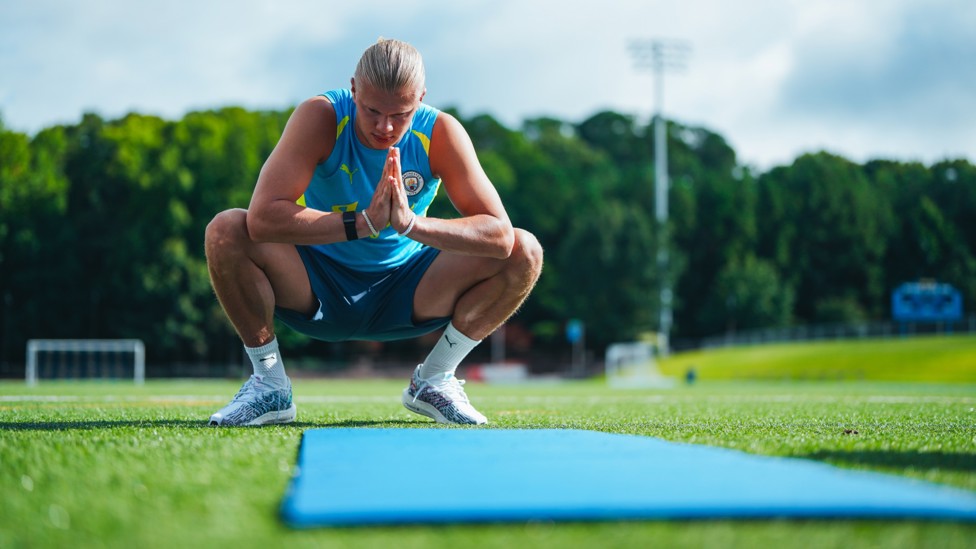 COOL DOWN : Erling Haaland stretches out in the North Carolina heat