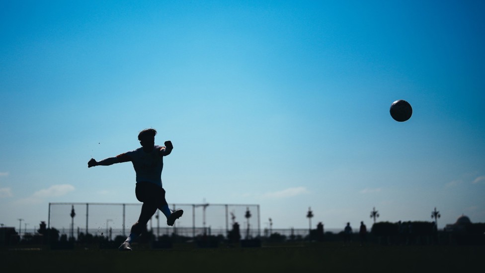 SHADOW PLAY: Jack Grealish lets fly with a shot.