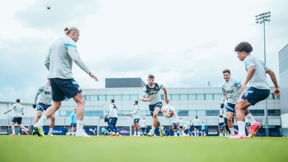 ACTION STATIONS: The lads go through a rondo session.