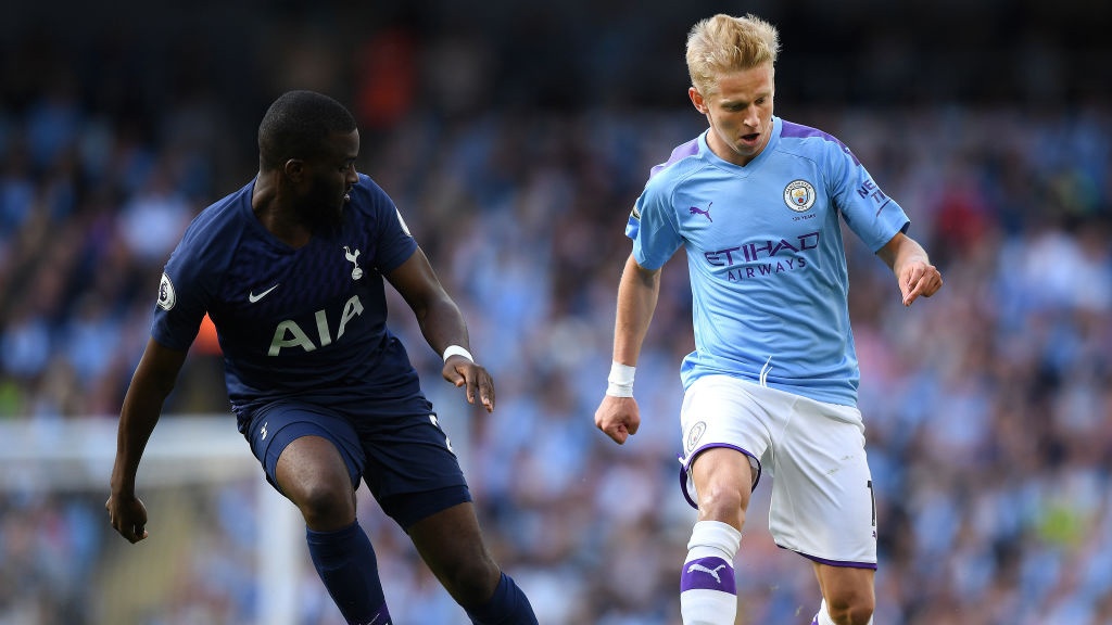 PRESSURE : Oleksandr Zinchenko drives forward_