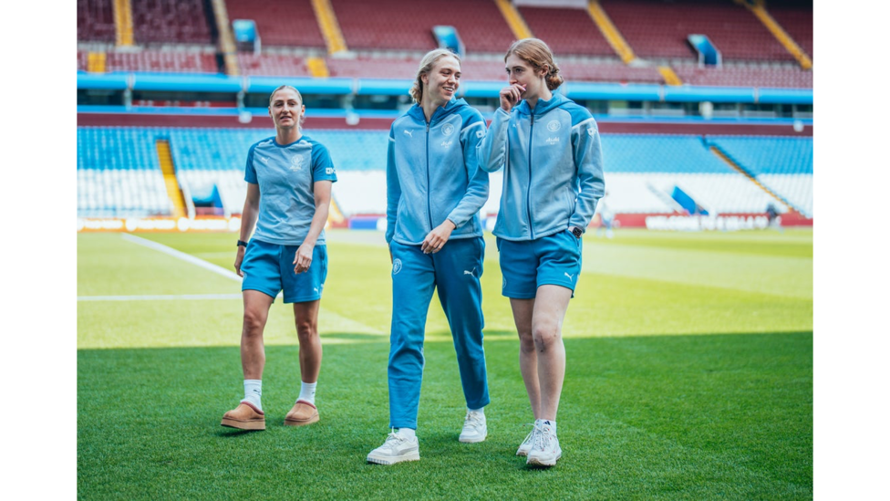 GETTING A FEEL: Players walk along the turf