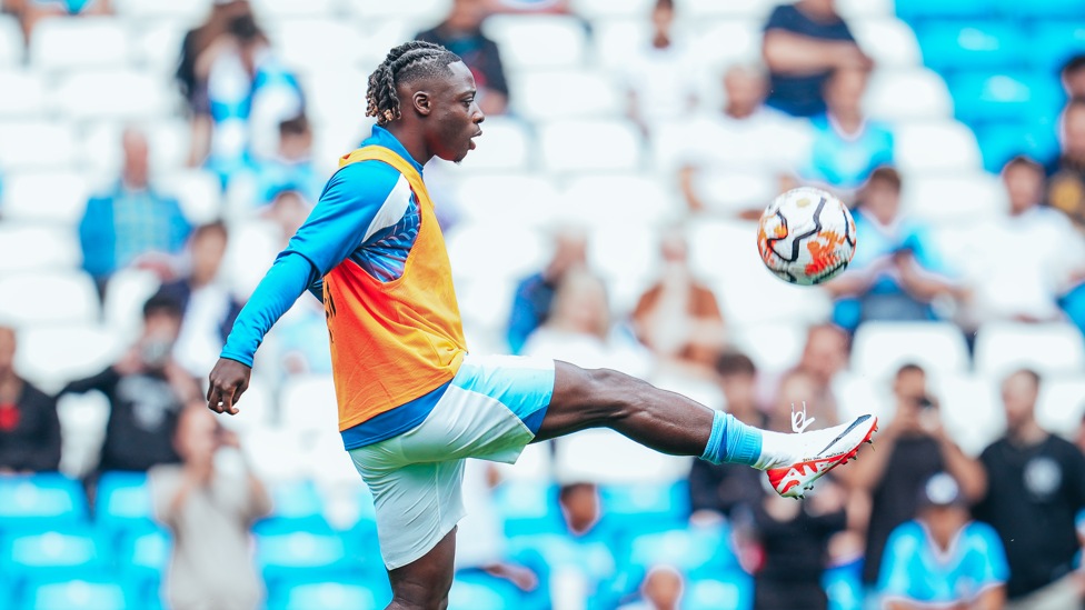 NEW BOY: Jeremy Doku warming up ahead of his debut at the Etihad.