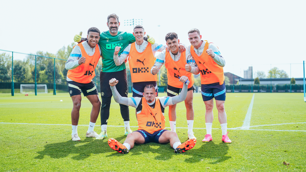 THE WINNING TEAM : A handful of players celebrate to camera. 