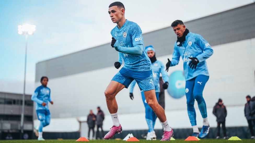 ON YOUR TOES : Phil Foden flaunts his agility during the warm up drills. 