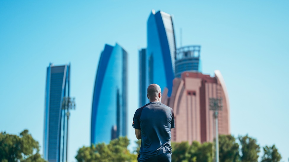 The boss watches on with a spectacular backdrop