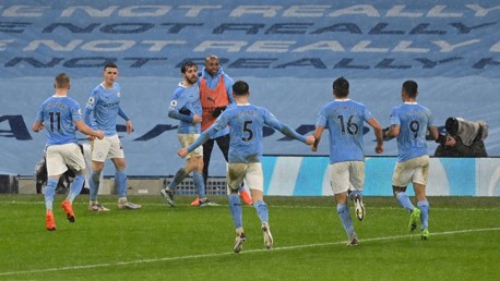 SQUAD GOALS: The team celebrate the breakthrough