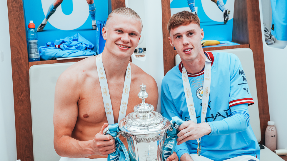 FA CUP SUCCESS : Palmer and Erling Haaland smile for the camera following our FA Cup win over Manchester United in May 2023. 