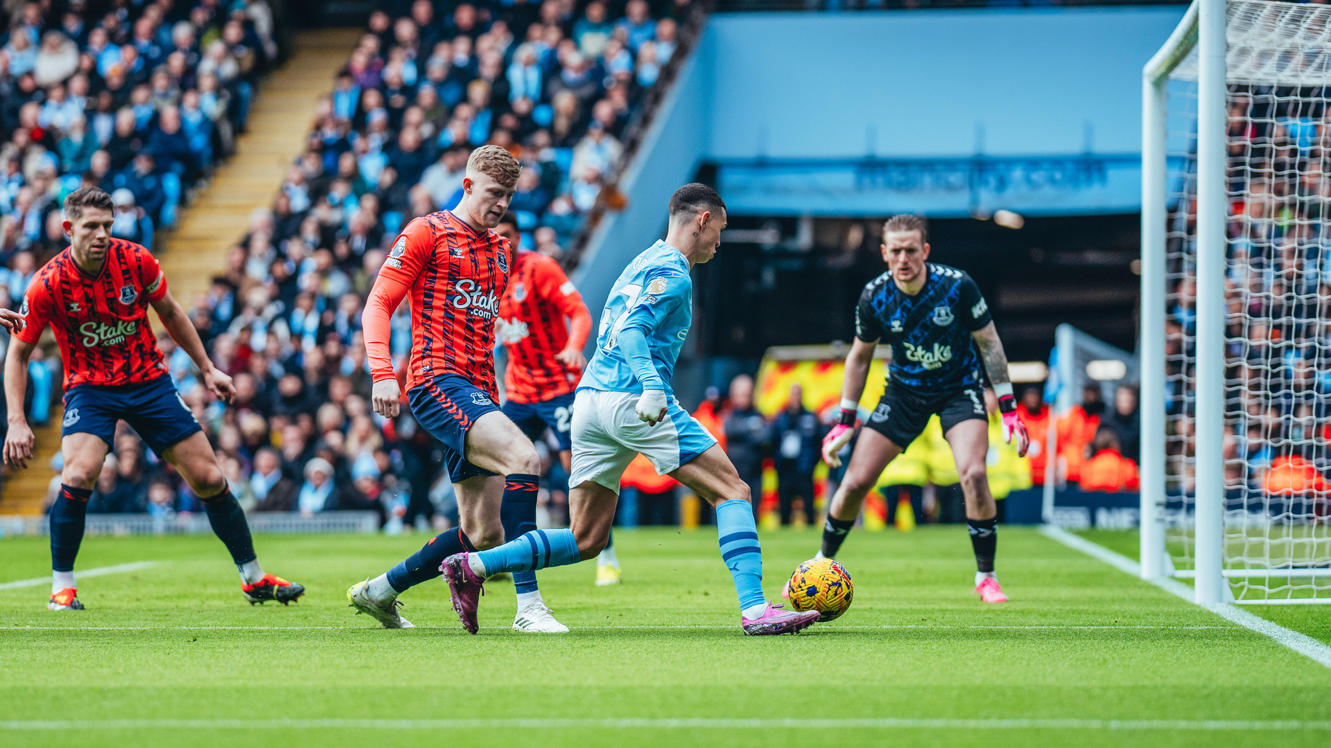 ONE OF OUR OWN: Phil Foden takes the fight to Everton.