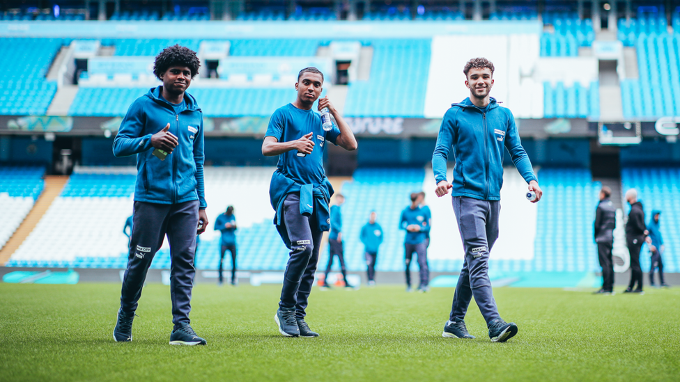 FEELING AT HOME: The players got a touch of the turf before kick off.