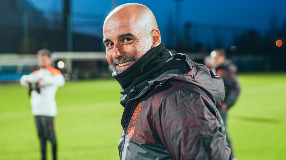 FREEZE FRAME: Pep Guardiola shares a smile.