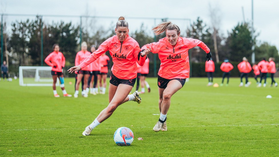 DRIVING ON: Poppy Pritchard and Lauren Hemp turn up the intensity.