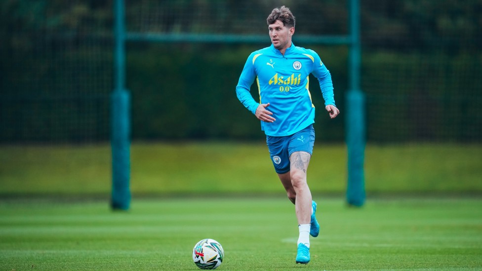 SUPER SUB : Late goal scorer John Stones on the ball in training.