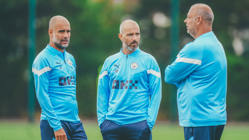 PEP TALK : Pep Guardiola in discussion with Enzo Maresca and Rodolfo Borrell