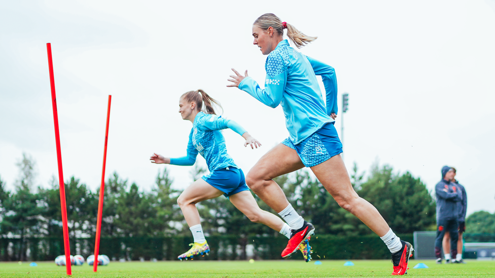 STRIDING ALONG : Jess Park and Jill Roord stretching their legs out on the CFA pitches. 