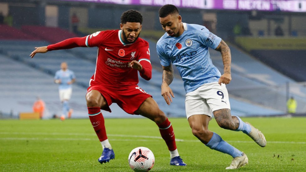 GAB ON THE RUN: Gabriel Jesus looks to get the better of Joe Gomez