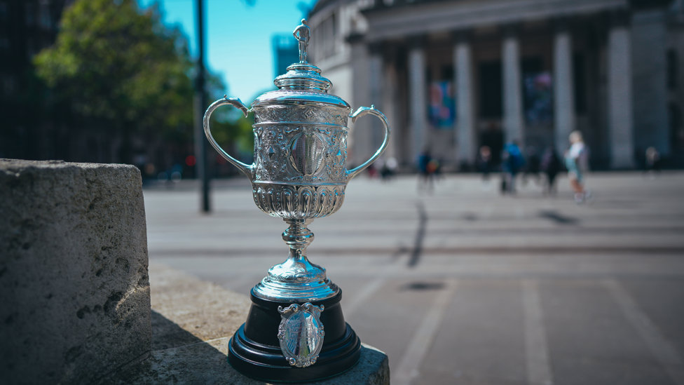 SUNNY MANCHESTER : The sun makes a guest appearance as we guide the trophy round the city.