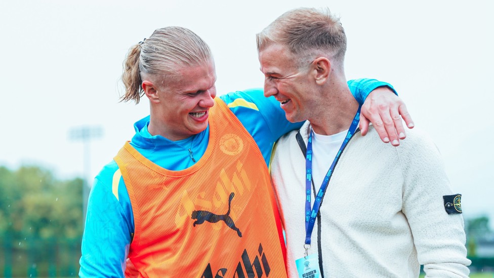 HART ON HIS SLEEVE  : Erling Haaland and Hart in fine spirits.