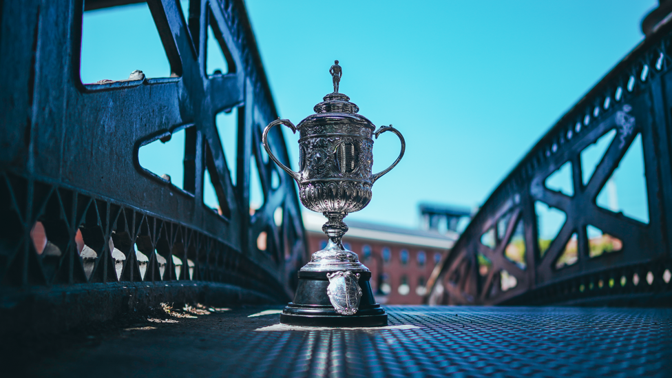 BRIDGES AND BEAUTY : The Cup pictured in some of Manchester's most historic areas.