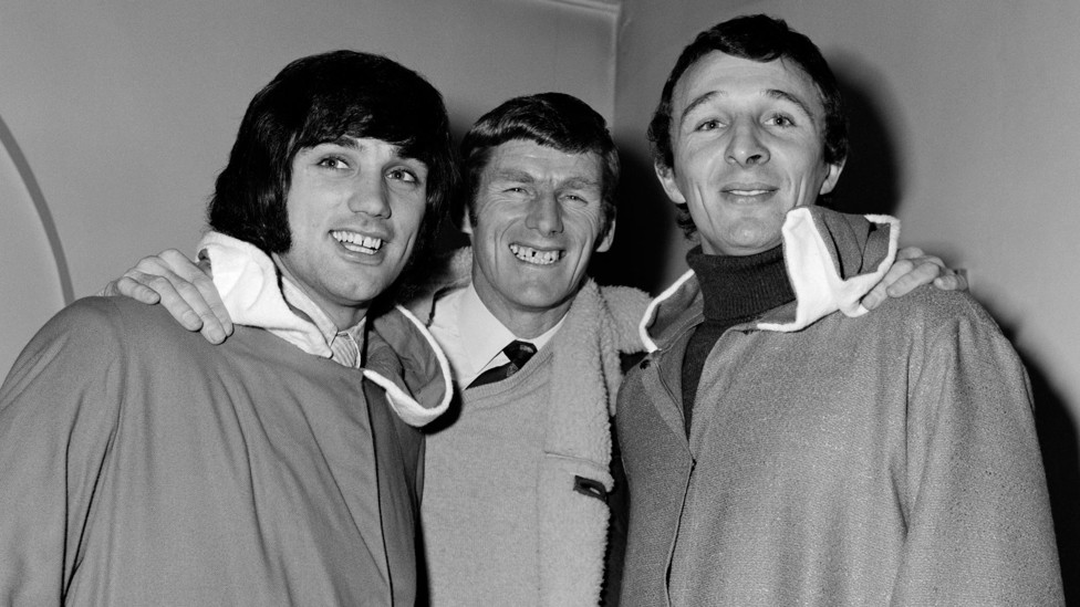 BEST OF FRIENDS : Tony Book enjoys a December 1970 Christmas charity event alongside Manchester United star George Best with Manchester City's Mike Summerbee