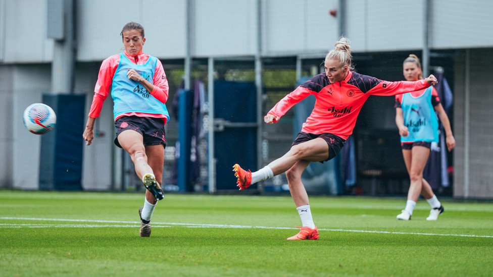 PASSING PLAY : Alex Greenwood plays the pass under pressure from Filippa Angeldahl