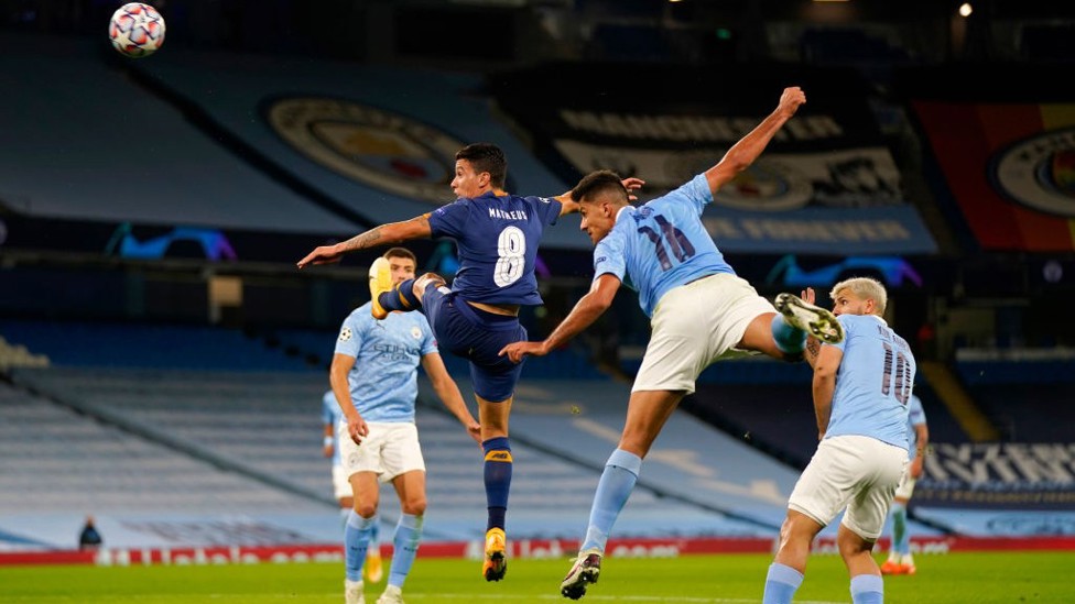 UP HIGH: Rodrigo rises highest from a free-kick but can't find the target