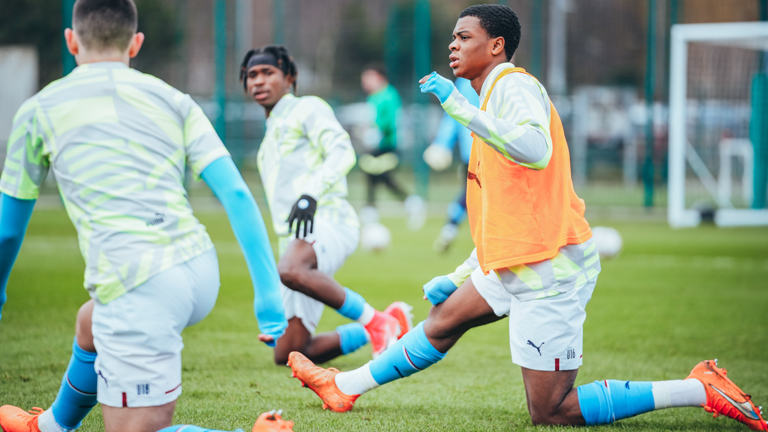 PRE MATCH PREP: The squad getting warmed up prior to kick off.