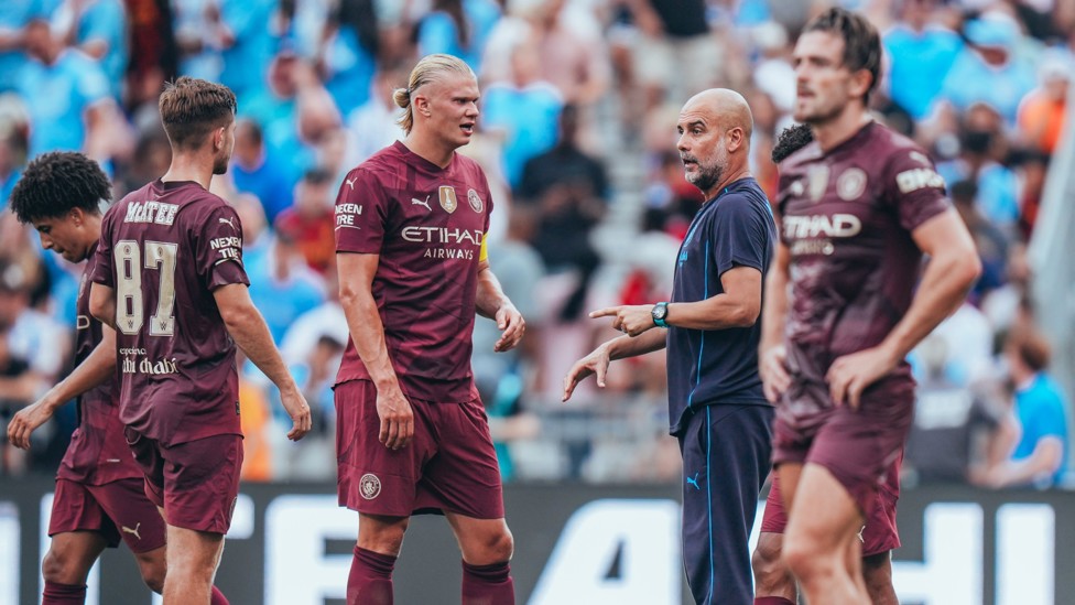 PEP TALK  : The boss passes a message to his players. 