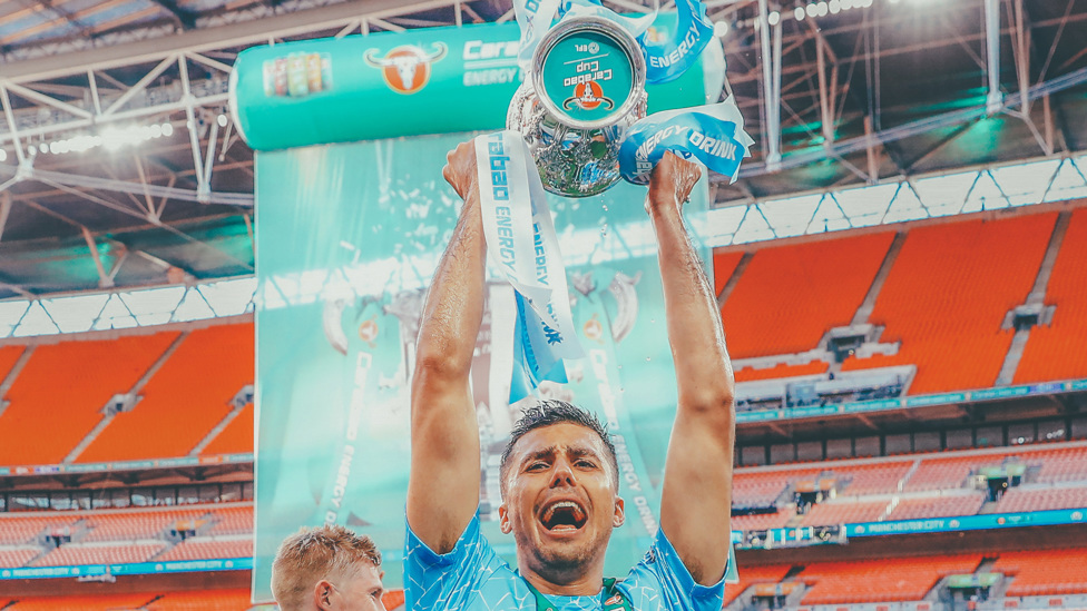 AND AGAIN... : Rodrigo holds the 2020/21 Carabao Cup trophy aloft after winning it for the second time in two seasons