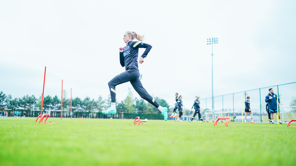 STRIDING FORWARD : Esme Morgan working hard ahead of Reading.