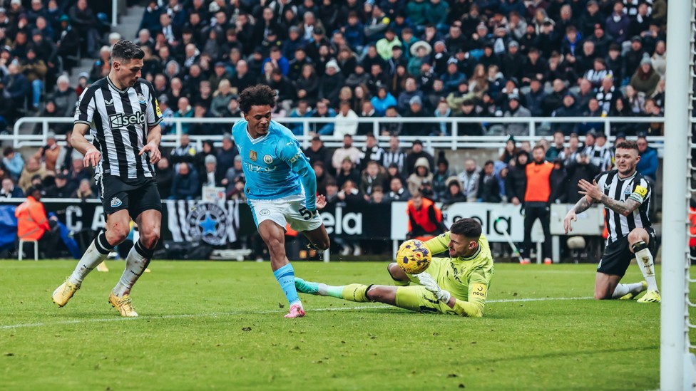 DECISIVE IMPACT : Bobb scores the winner in the closing stages of our January match at Newcastle