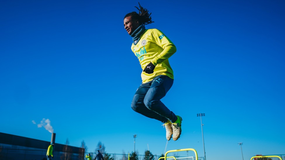 FLYING DUTCHMAN : Nathan Ake leaps. 